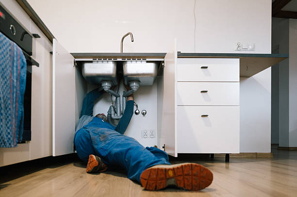 Professional Drain Cleaning technician working in Westport, MA